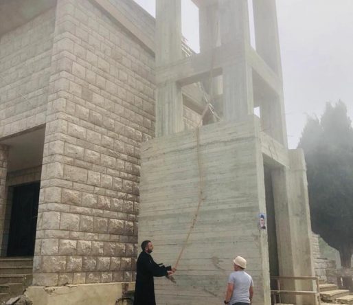 الأب روني أبي رزق يبارك جرس مار غريغوريوس-جوار بواشق image